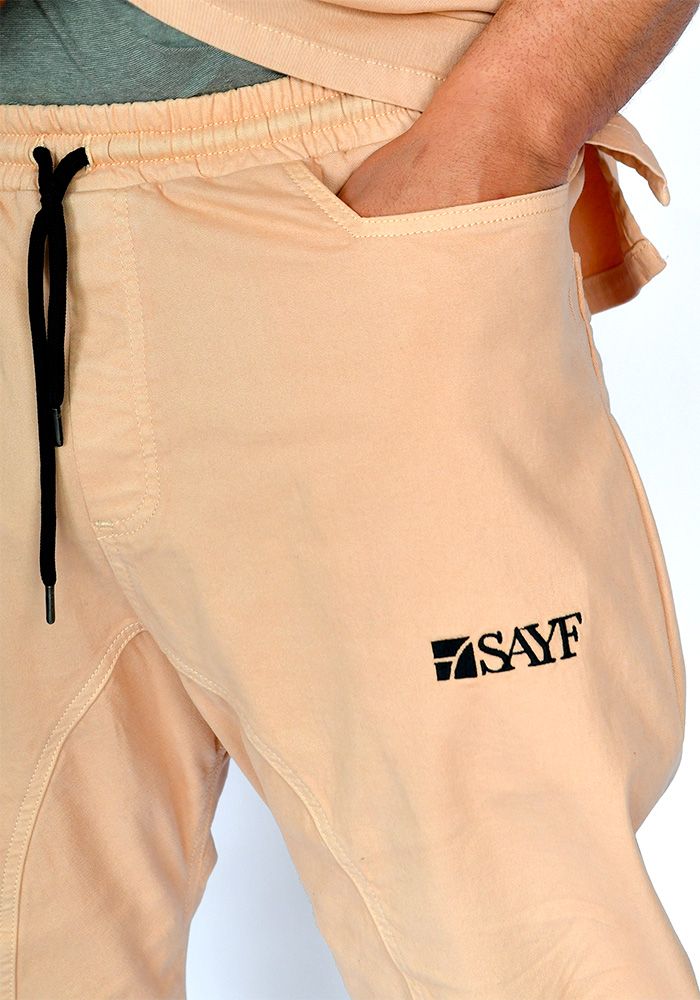 Ensemble été sayf origins beige zoom sur la poche avant