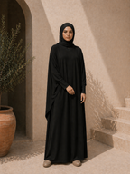 Photo d'une abaya noire 1 pièce Col V bi-colore