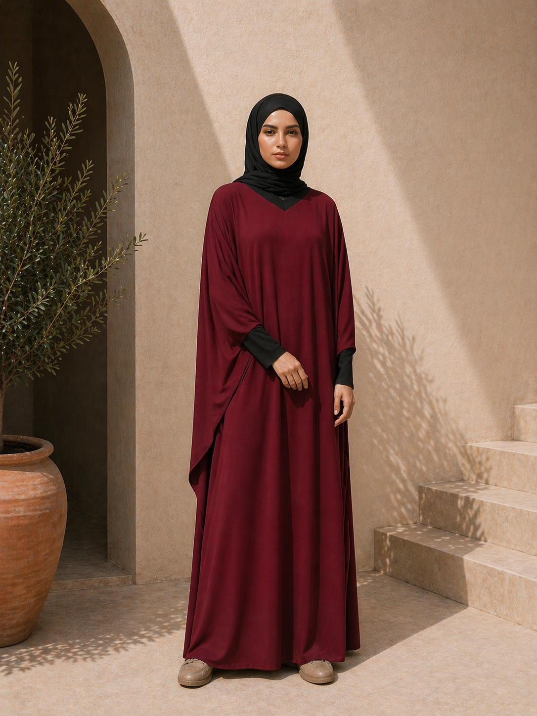 Photo d'une abaya rouge qualité premium col V bi colore 1 pièce